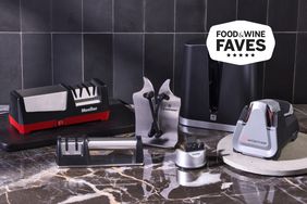  A variety of knife sharpeners side-by-side on a kitchen countertop