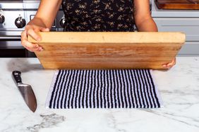 Chop Safely and Use a Wet Towel Under Your Cutting Board