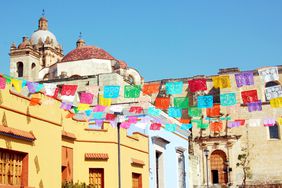 Oaxacaâs streetscape is impossibly colorful year-round.