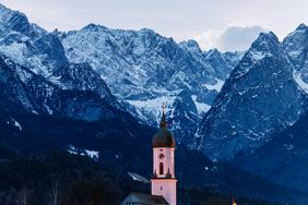 Germany’s highest mountain overlooks the village of Garmisch- Partenkirchen and its iconic St. Martin church